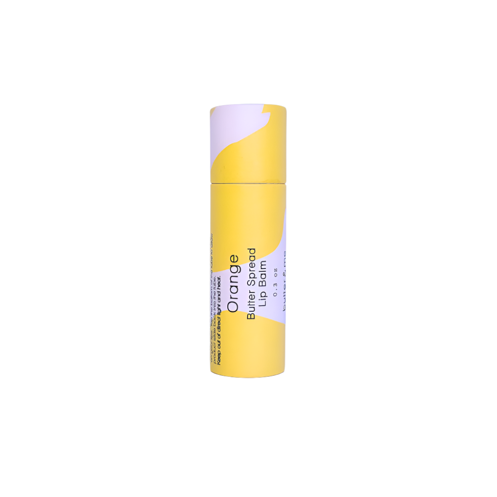Hydrating orange lip balm in a biodegradable tube, infused with natural butters for smooth, nourished lips
