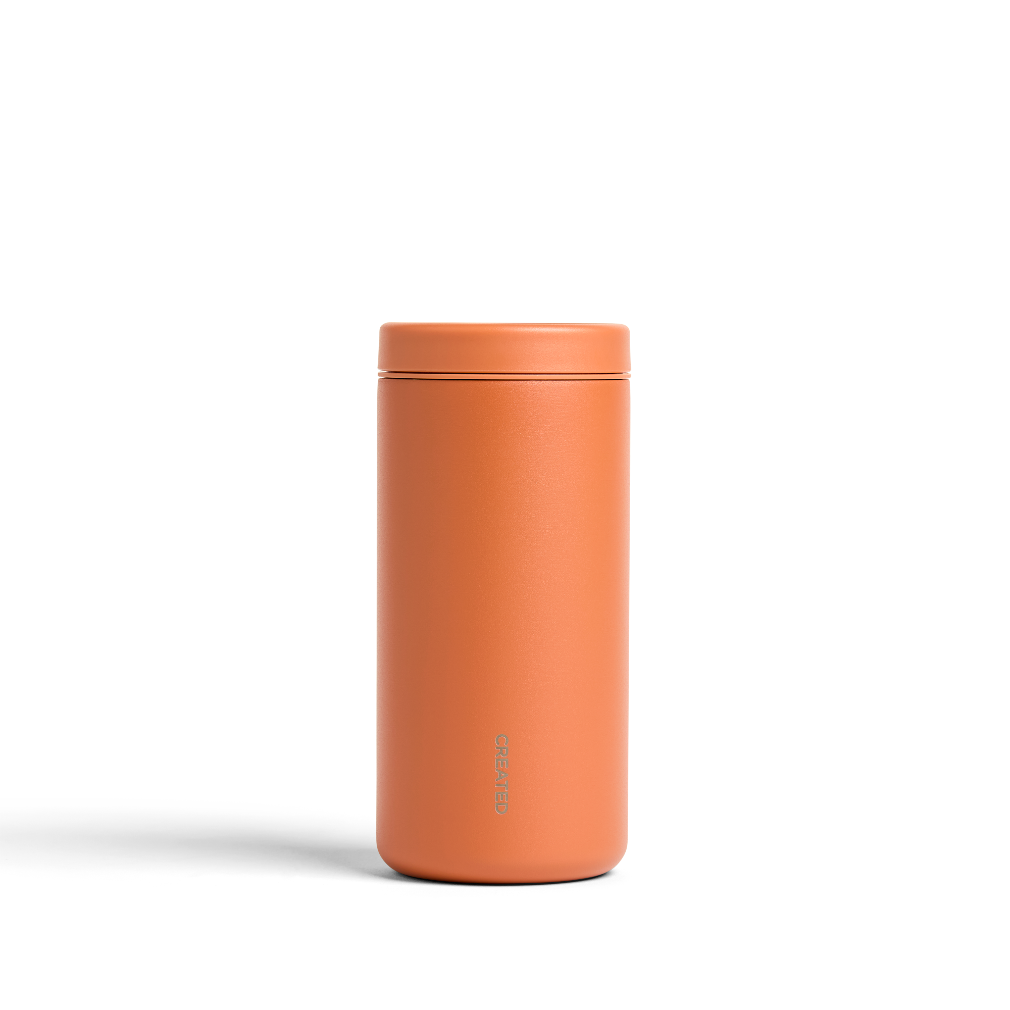 Terracotta 12oz Nomad tumbler with 360° sip lid, leakproof twist seal, great for commuting, office, or daily coffee.