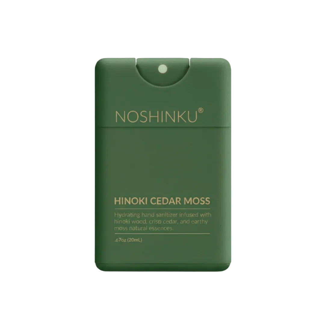 Noshinku Hinoki Cedar Moss hand sanitizer in a dark green rectangular bottle with gold lettering, shown on a clean white background.