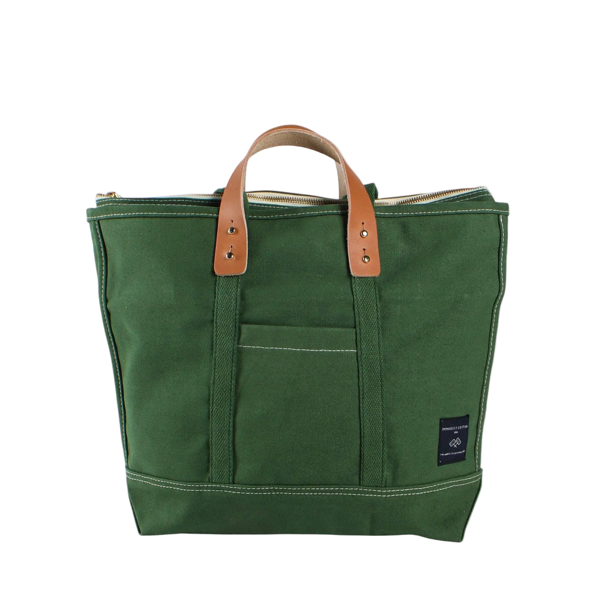 Green tote bag with brown leather handles on a white background