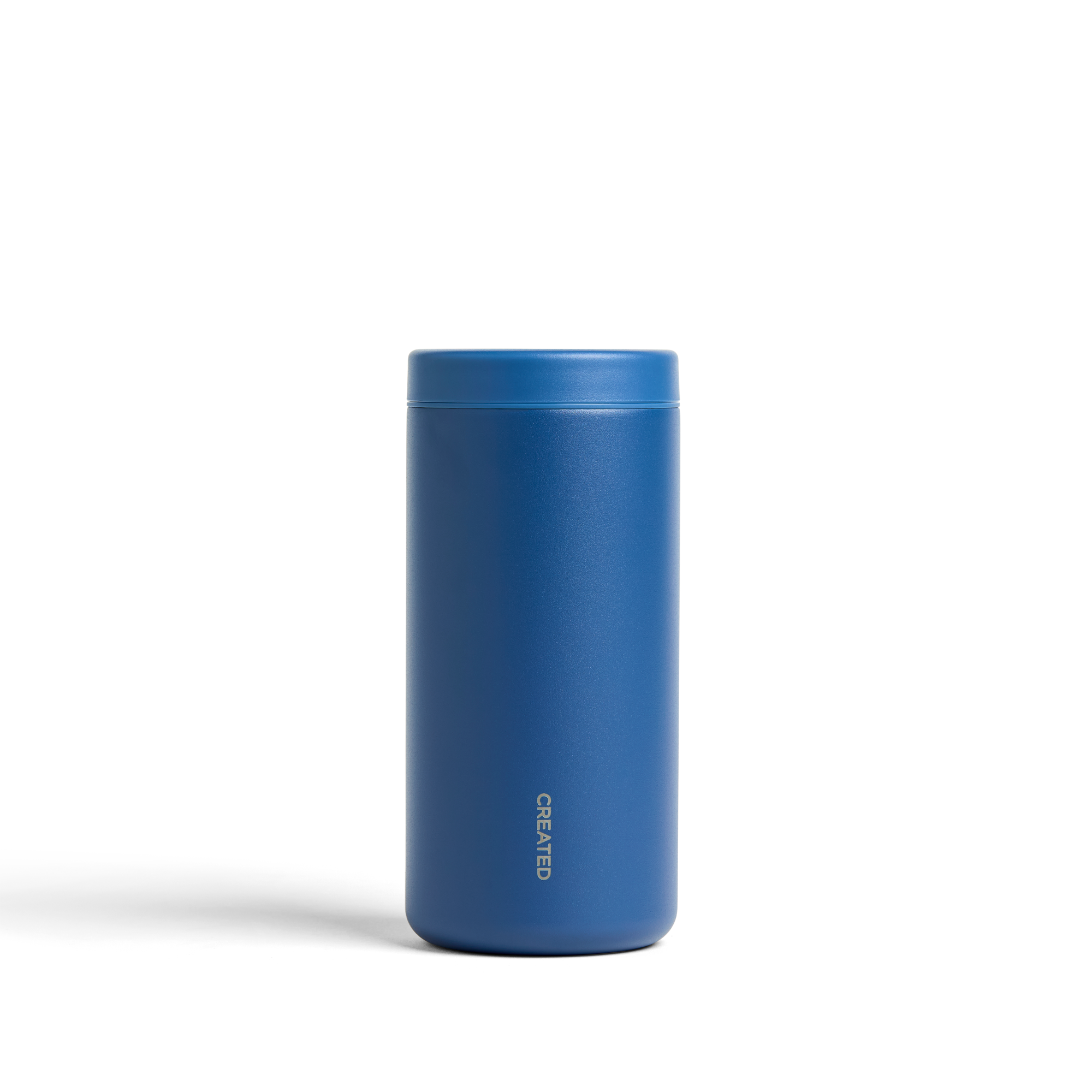 Pacific blue 12oz Nomad tumbler with 360° sip lid, twist-seal design, perfect for road trips, camping, or outdoor drinks.