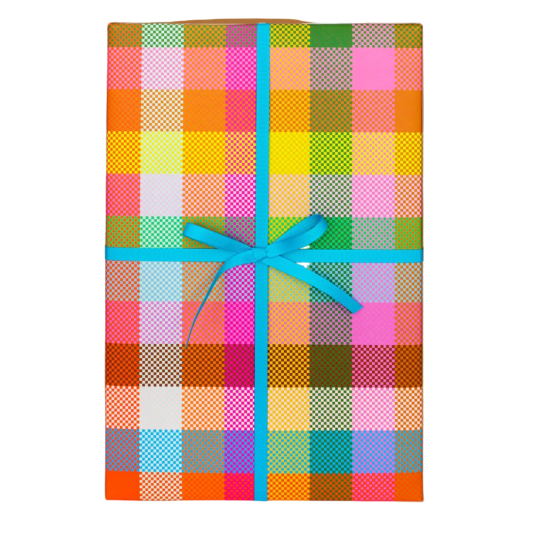 Colorful checkered wrapping paper onn a giftbox with a blue ribbon on a white background