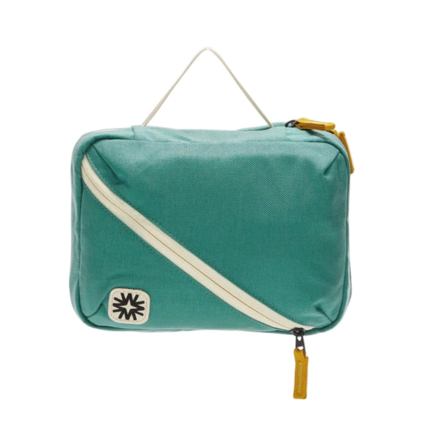 Seafoam green toned canvas toiletry pack dual main compartments and small front organizers. Perfect for camping and long travels.
