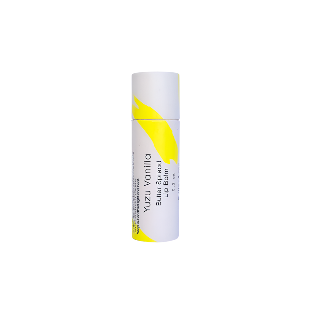 Yuzu vanilla lip balm in biodegradable tube, infused with natural butters for smooth, hydrated lips