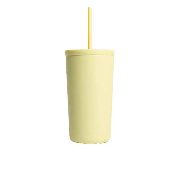 Yellow tumbler with a straw on a white background
