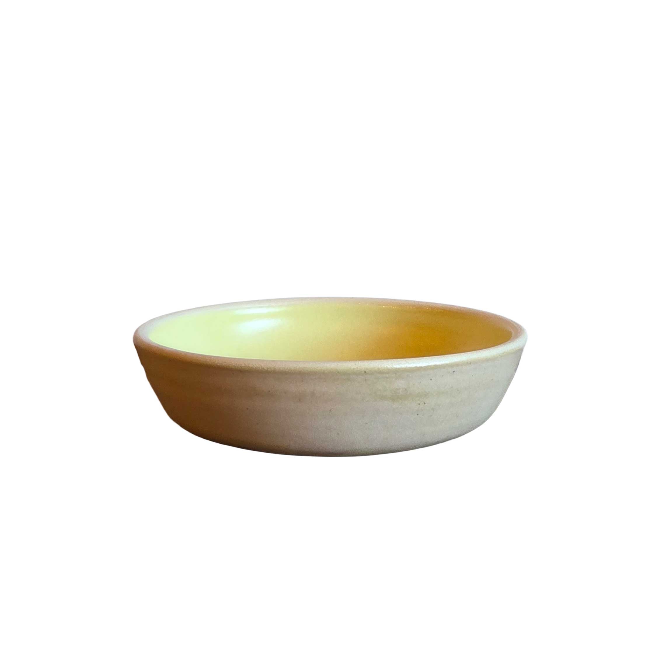 Handmade ceramic sauce bowl, 4x1 in, cantalope orange outside with butter yellow interior, stackable and perfect for dips or sauces.