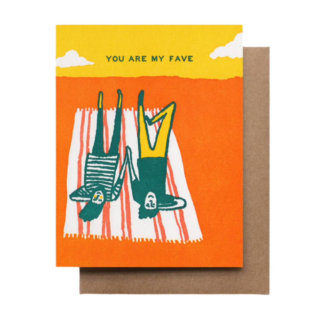 Bright retro design of a couple laying on a blanket with the phrase "You are my fave", blank inside. Perfect for any celebrations or token of love.