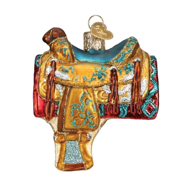 Decorative glass ornament of a horse saddle with intricate details on a white background
