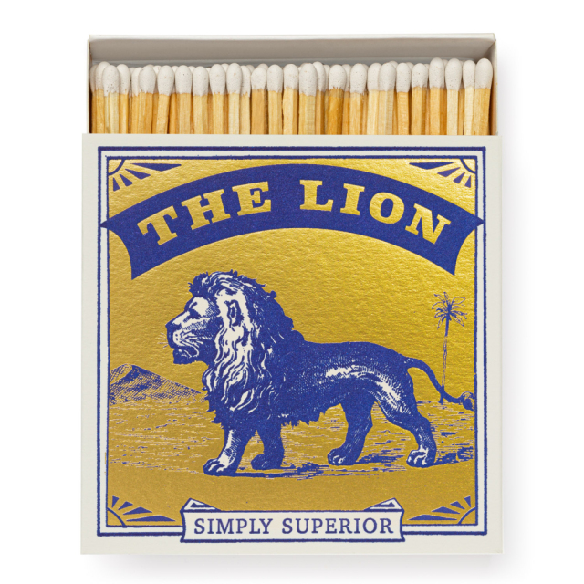 Metallic gold and deep blue matchbox with classic 'Simply Superior' lion motif and gold lion centerpiece.