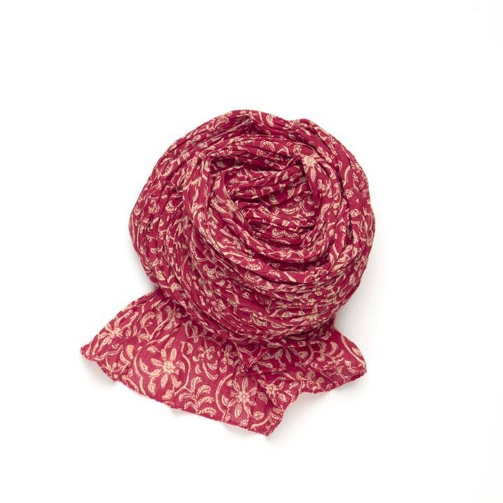 Fair trade made scarf in bold trellis red, 20x80 inches, lightweight woven design for versatile everyday or evening wear.
