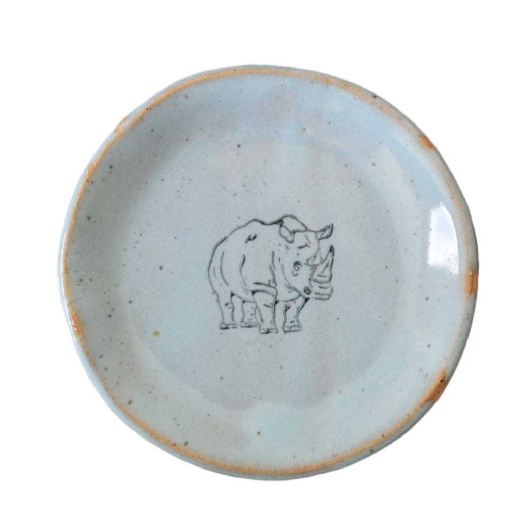 4-inch handcrafted stoneware mini plate with rhino illustration fused to glaze, ideal for snacks, trinkets, or décor.