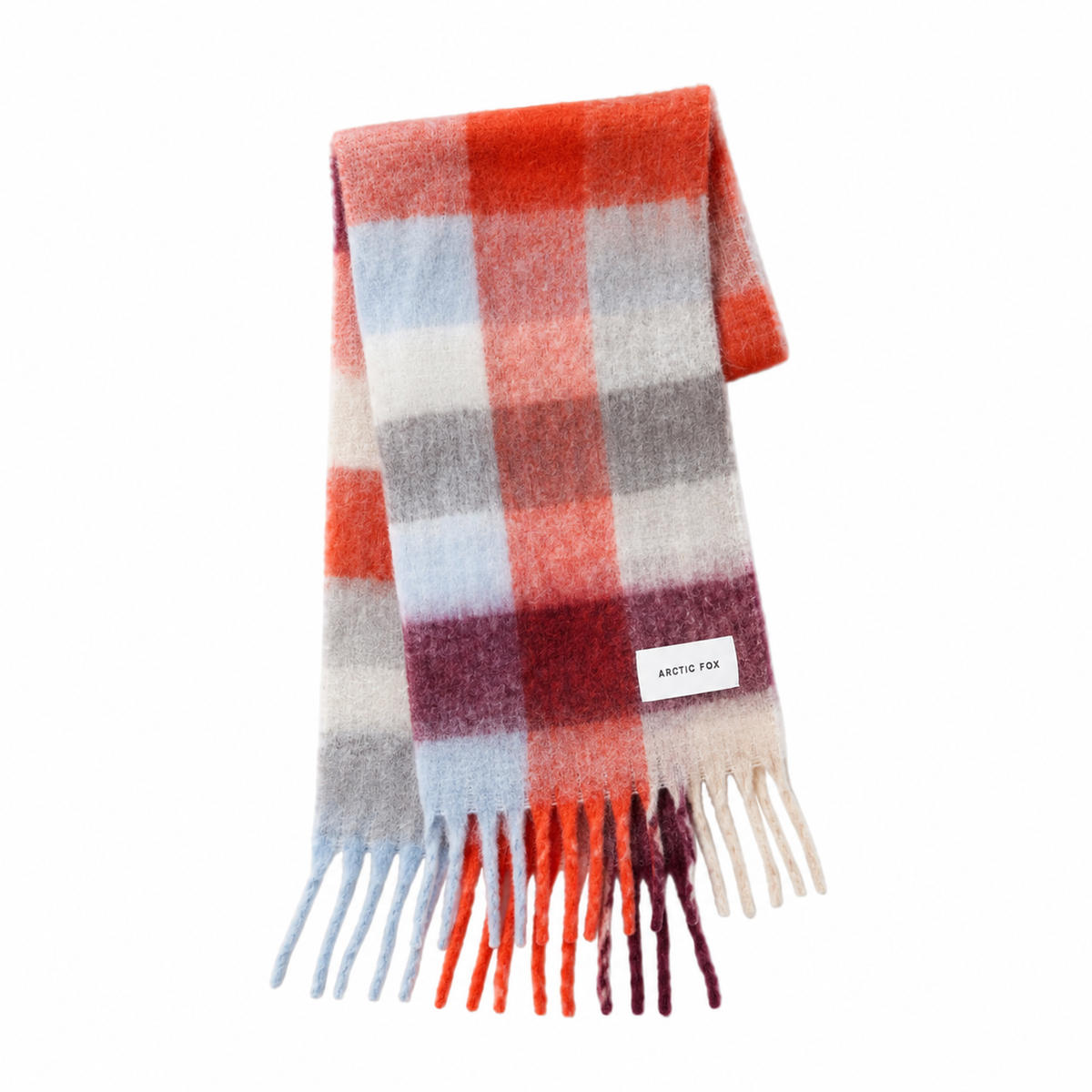 A fuzzy plaid scarf with orange, red, light blue, and purple stripes, against a white studio backdrop.