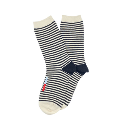 Crew socks with black and white stripes to add a fun pop to any outfit or for being cozy at home. 