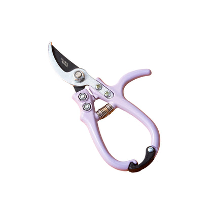 Purple gardening shears on an white background