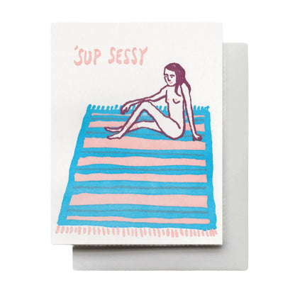 Retro beach vibe card that has a figure laying on a towel with the phrase "Sup Sessy", blank inside, perfect for birthdays or anniversaries. 