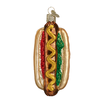 Decorative hot dog ornament with mustard, ketchup, and relish on a white background