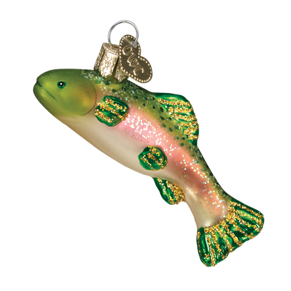 A glass rainbow trout Christmas ornament with glittery green and gold detailing, a pink stripe, and a silver hanging loop on a plain white background.