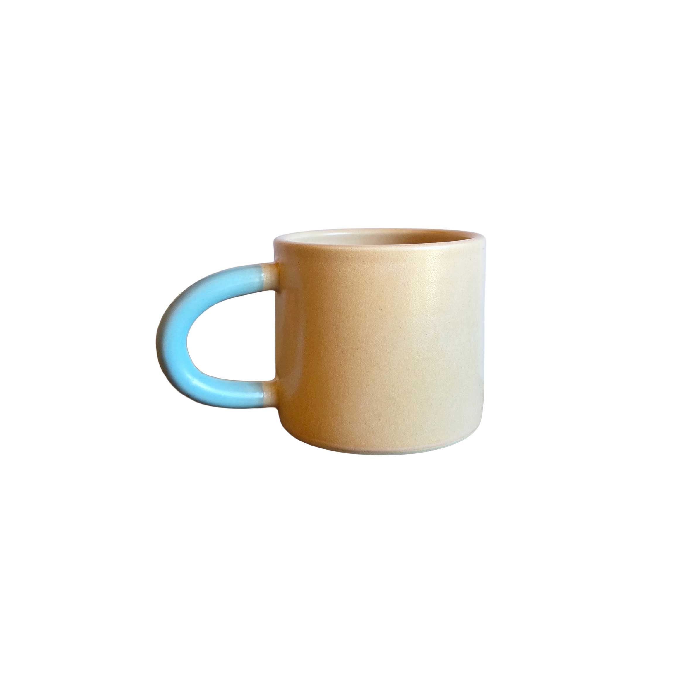 Classic ceramic mug in cantaloupe orange with sky blue handle, 10oz size, perfect for coffee, tea, or everyday sipping.