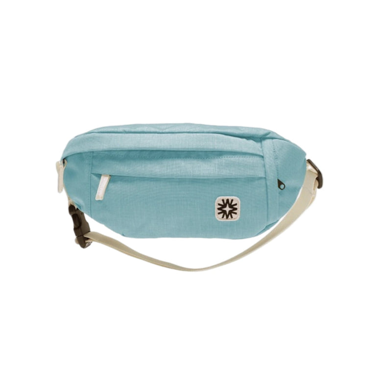 Baby blue canvas Louie Sling bag with adjustable strap, lightweight crossbody perfect for travel or summer outings.