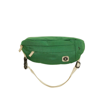 Juniper green canvas Louie Sling bag with adjustable strap, lightweight crossbody for hands-free errands or travel.