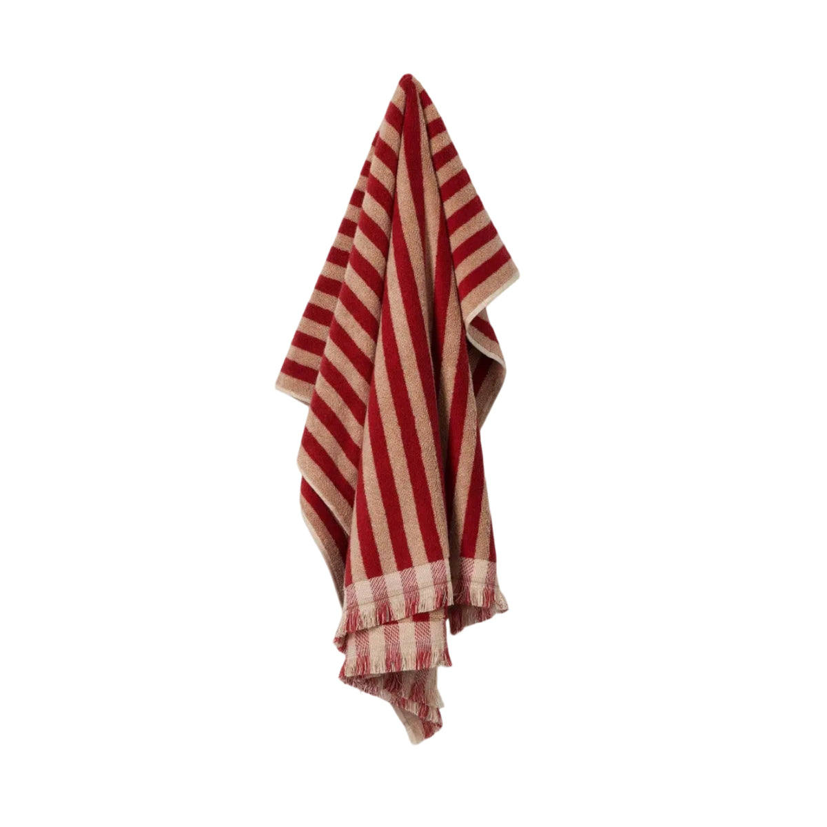 A striped towel with alternating red and beige vertical stripes, featuring fringed edges, hanging against a white background.