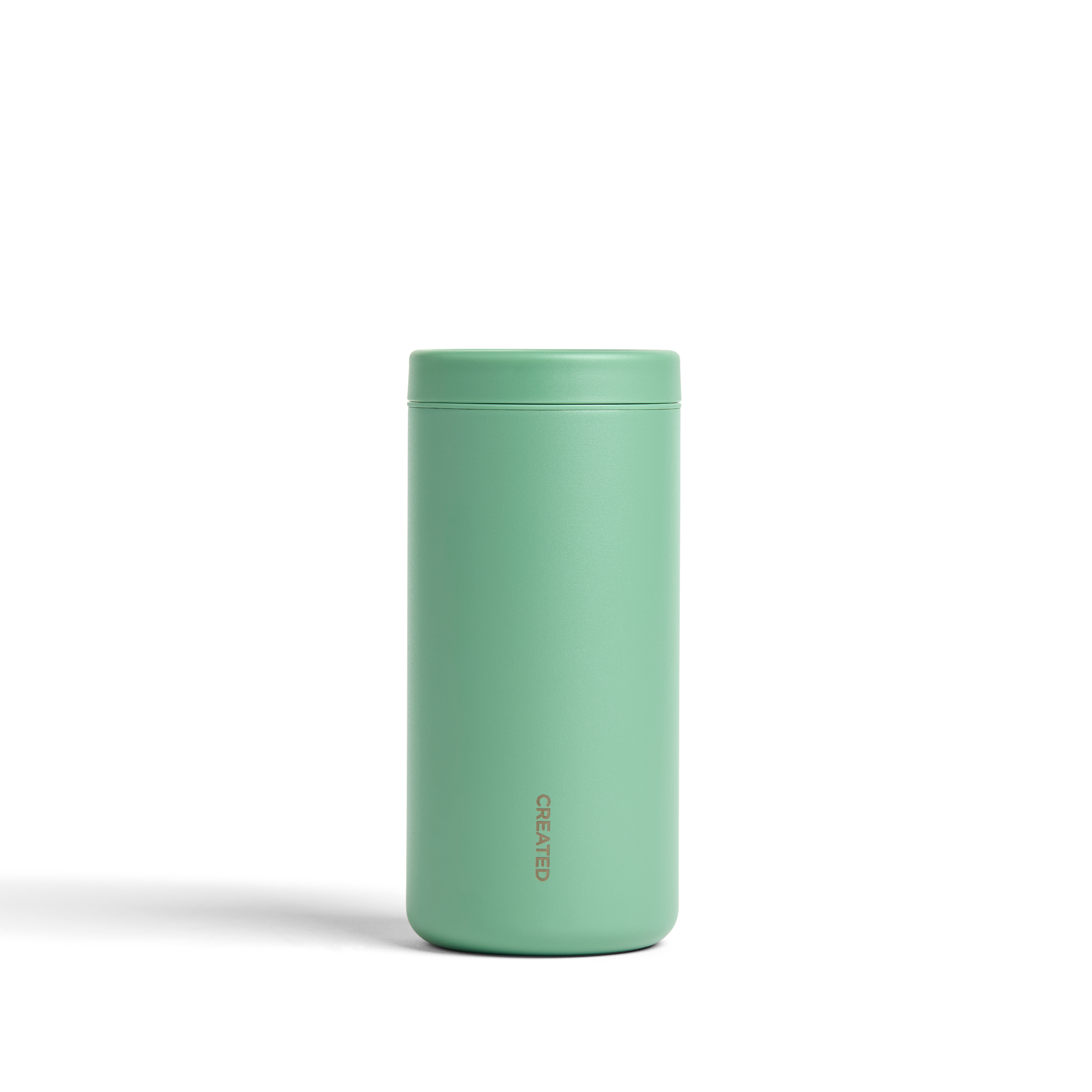 Sage green 12oz Nomad tumbler with 360° sip lid, secure twist seal, ideal for daily use or traveling.