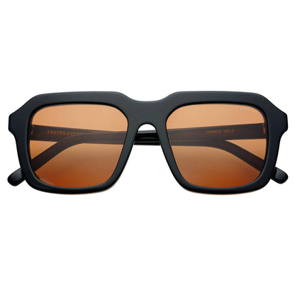 Sunglasses with black frame and brown lenses on a white background