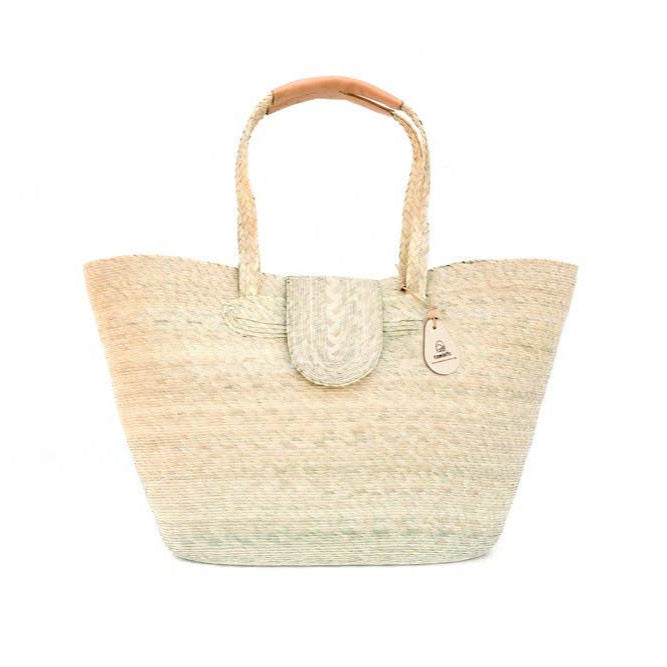 Large palm fiber woven tote with leater straps and a velcrotab for closing. Perfect for beach days or picnics. 