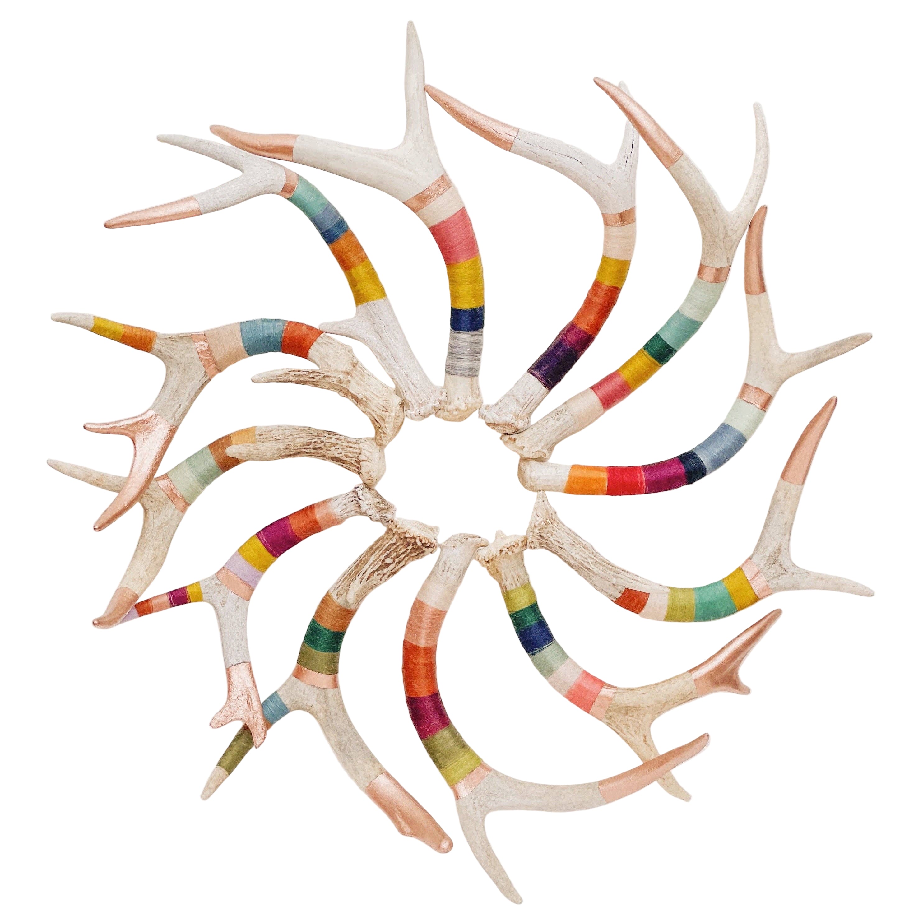 Small naturally shed deer antler wrapped in wool and painted copper,placed for sculptural display or comes with leather hanging strap for wall art.