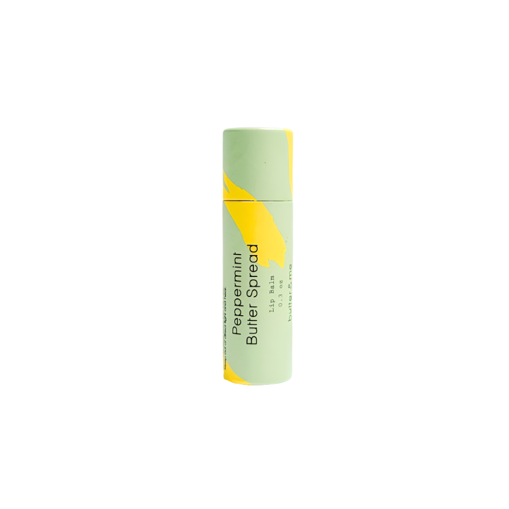Peppermint lip balm in a biodegradable tube, infused with natural butters for hydrated and smooth lips.