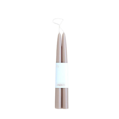 Pair of 12-inch beigey/gray colored dipped taper candles with 12-hour burn time, elegant for dining, décor, or gifting.