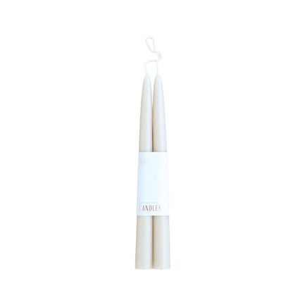 Pair of 12-inch soft partchment colored dipped taper candles with 12-hour burn time, elegant for dining, décor, or gifting.
