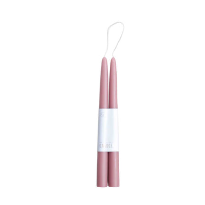 Pair of 12-inch rose colored dipped taper candles with 12-hour burn time, elegant for dining, décor, or gifting.