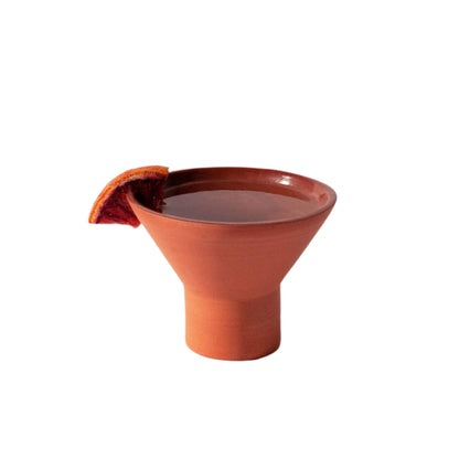 Handmade terra cotta ceramic stemless martini glass, ideal for sipping cocktails or mocktails.
