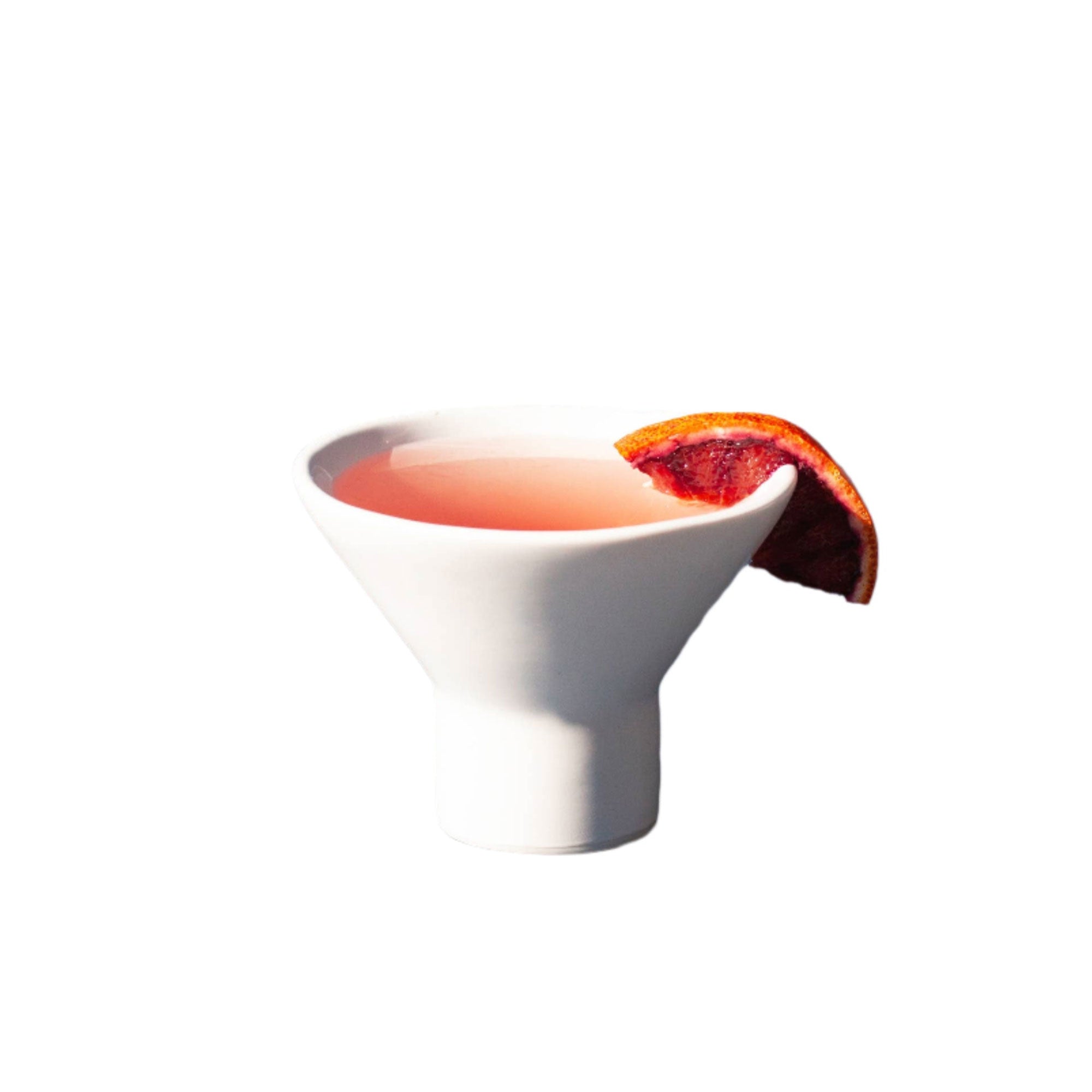 Handmade gloss white ceramic stemless martini glass, perfect for serving cocktails at parties or casual gatherings.