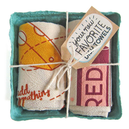 Pair of cotton tea towels with the ultimate wine and cheese pairing prints, eco-friendly, packed in a produce-style container. Perfect for any gift.